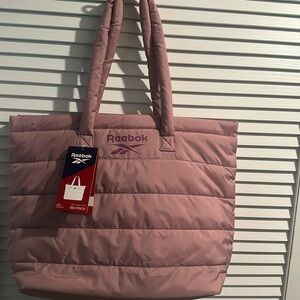 NWT Reebok Quilted Beatrice Tote with inside zippered pocket and zip closure.